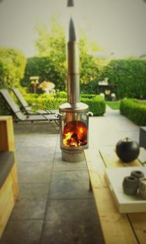Genieten in de zomer en winter bij een RVS tuinhaard!